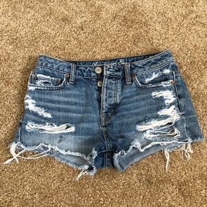 Mid rise distressed shorts